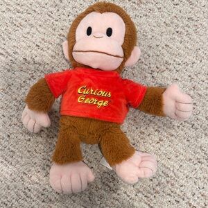 Brown and Red Stuffed Animal